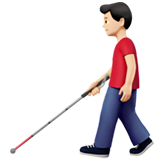 uomo con bastone bianco di orientamento: carnagione chiara