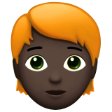 persona: carnagione scura e capelli rossi