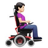 donna su sedia a rotelle motorizzata: carnagione chiara e a destra