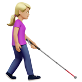 donna con bastone bianco di orientamento: carnagione abbastanza chiara e a destra