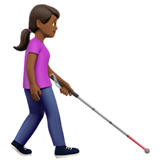 donna con bastone bianco di orientamento: carnagione abbastanza scura e a destra