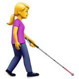 donna con bastone bianco di orientamento: a destra