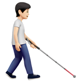 persona con bastone di orientamento: carnagione chiara e a destra